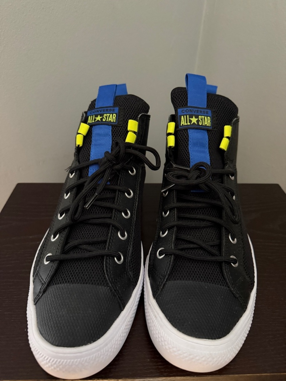 Converse Black High-Top Sneakers with Blue Pull Tabs & Neon Yellow Accents